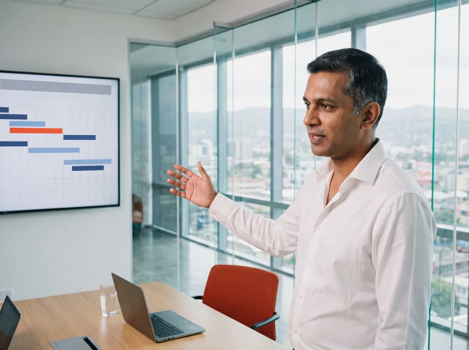 Technical lead walking a client through a support timeline on a wall screen