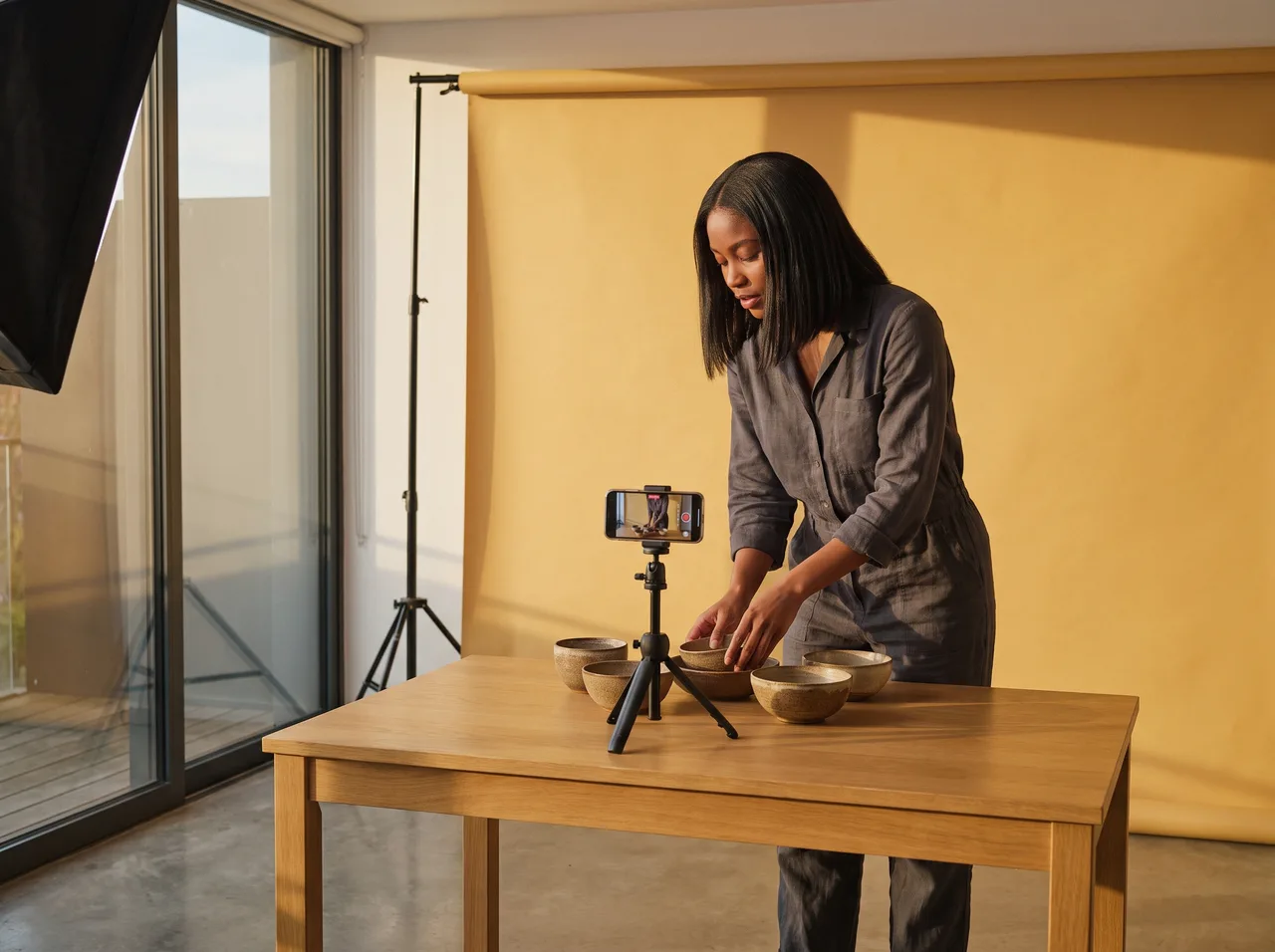 Creator filming a product flat-lay for social media